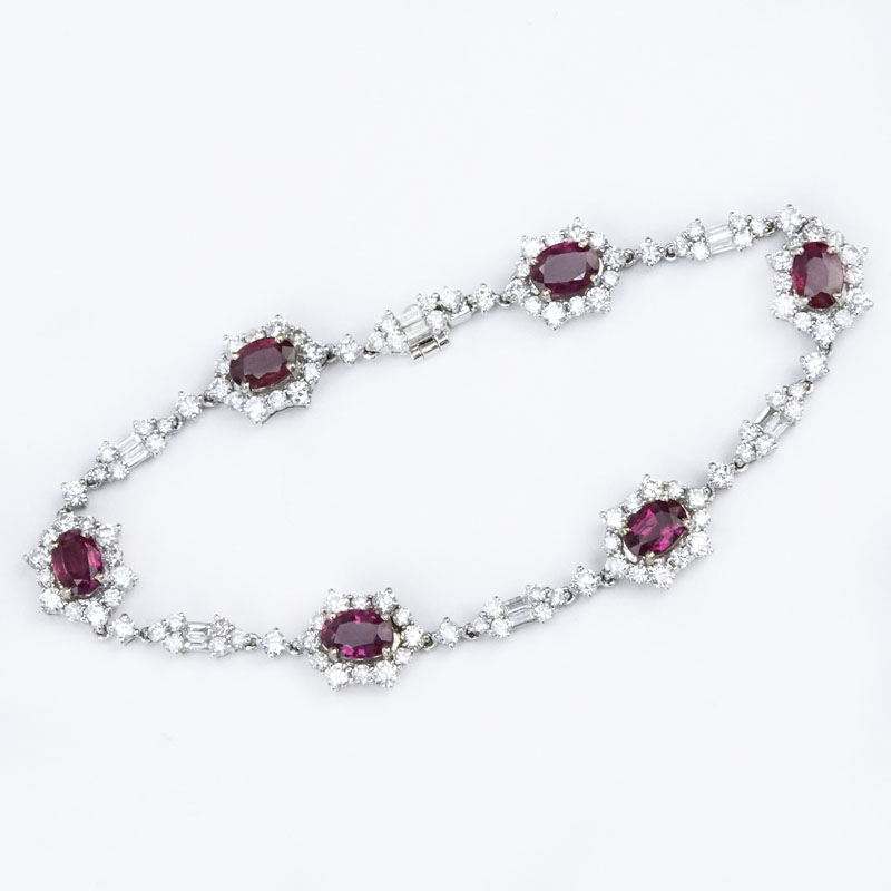 5.0 Carat Oval Cut Ruby, 4.75 Carat Round Brilliant and Baguette Cut Diamond and 18 Karat White Gold Bracelet.