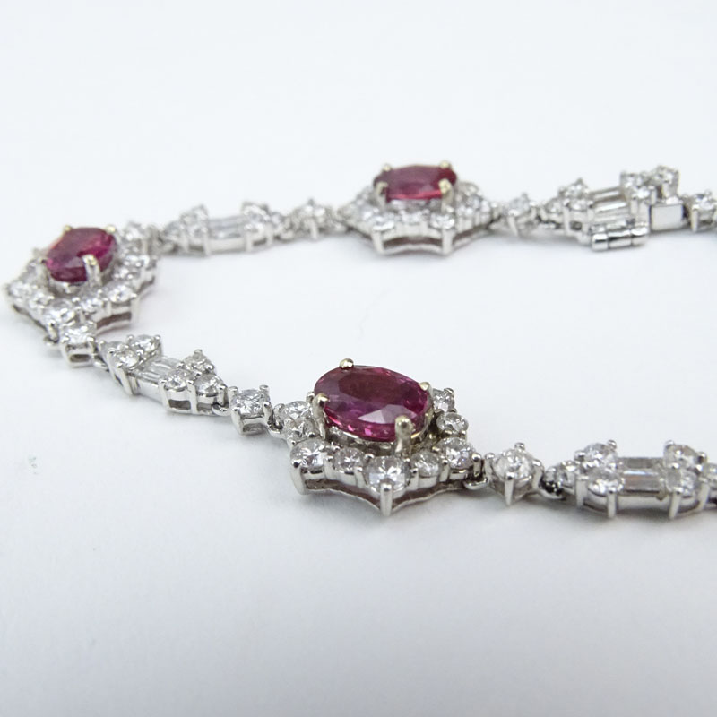 5.0 Carat Oval Cut Ruby, 4.75 Carat Round Brilliant and Baguette Cut Diamond and 18 Karat White Gold Bracelet.