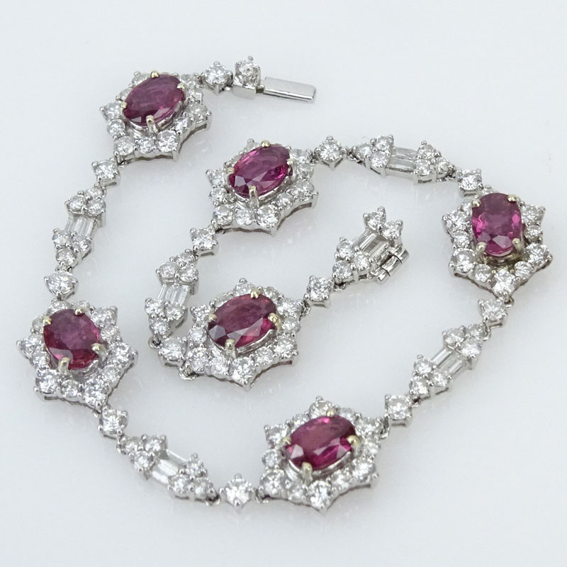 5.0 Carat Oval Cut Ruby, 4.75 Carat Round Brilliant and Baguette Cut Diamond and 18 Karat White Gold Bracelet.