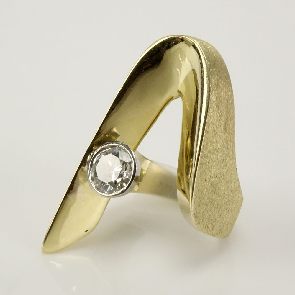 Lady's Retro Approx. .95 Carat Round Brilliant Cut Diamond and 14 Karat Yellow Gold Ring.