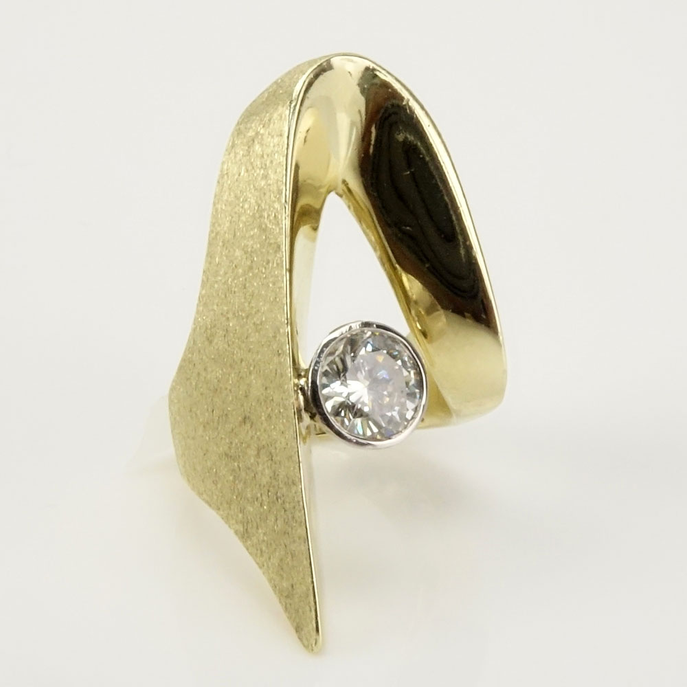 Lady's Retro Approx. .95 Carat Round Brilliant Cut Diamond and 14 Karat Yellow Gold Ring.