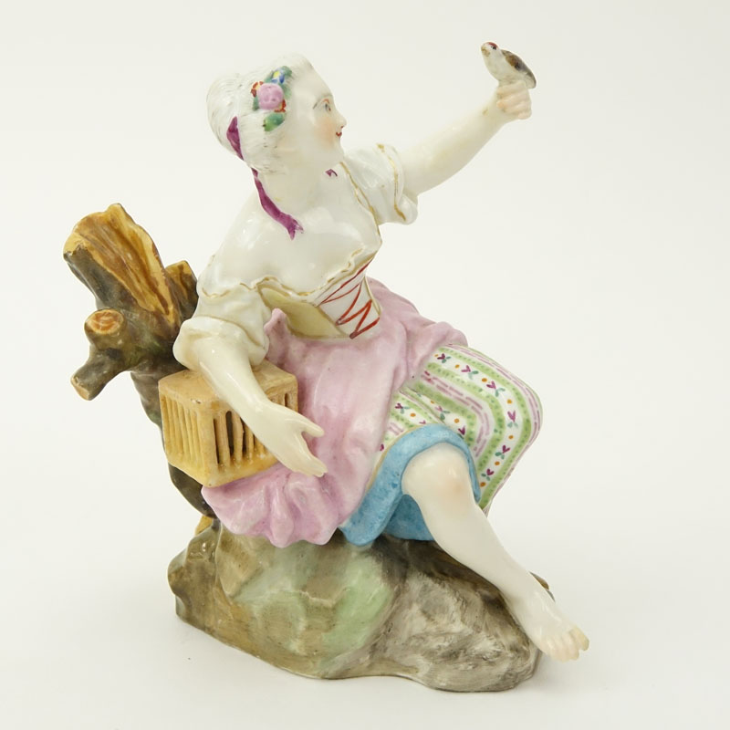 19th Century Meissen Porcelain Seated Girl with Bird Figurine