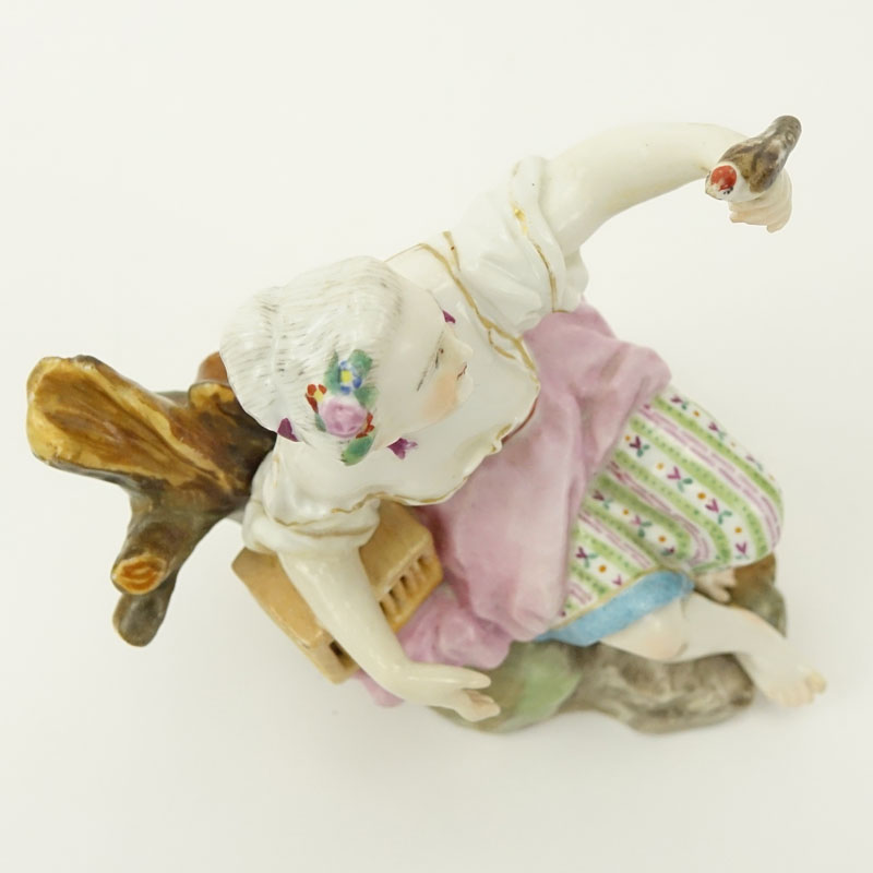 19th Century Meissen Porcelain Seated Girl with Bird Figurine