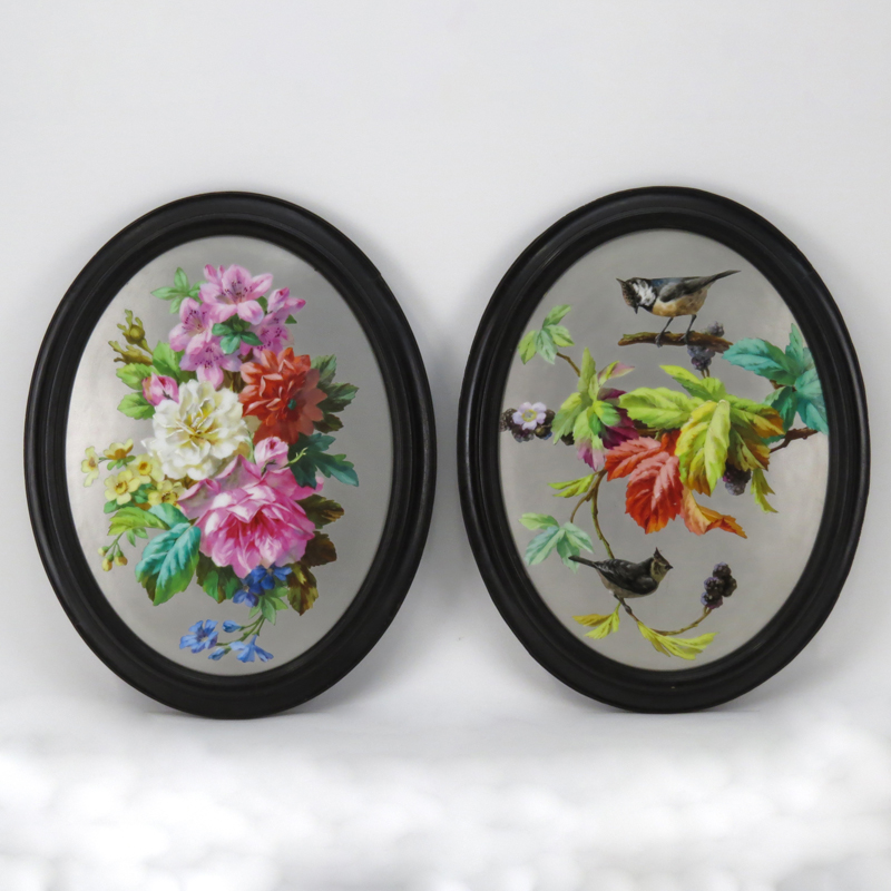 Pair of French Platinum Ground Porcelain Plaques, painted with floral and bird still life decoration