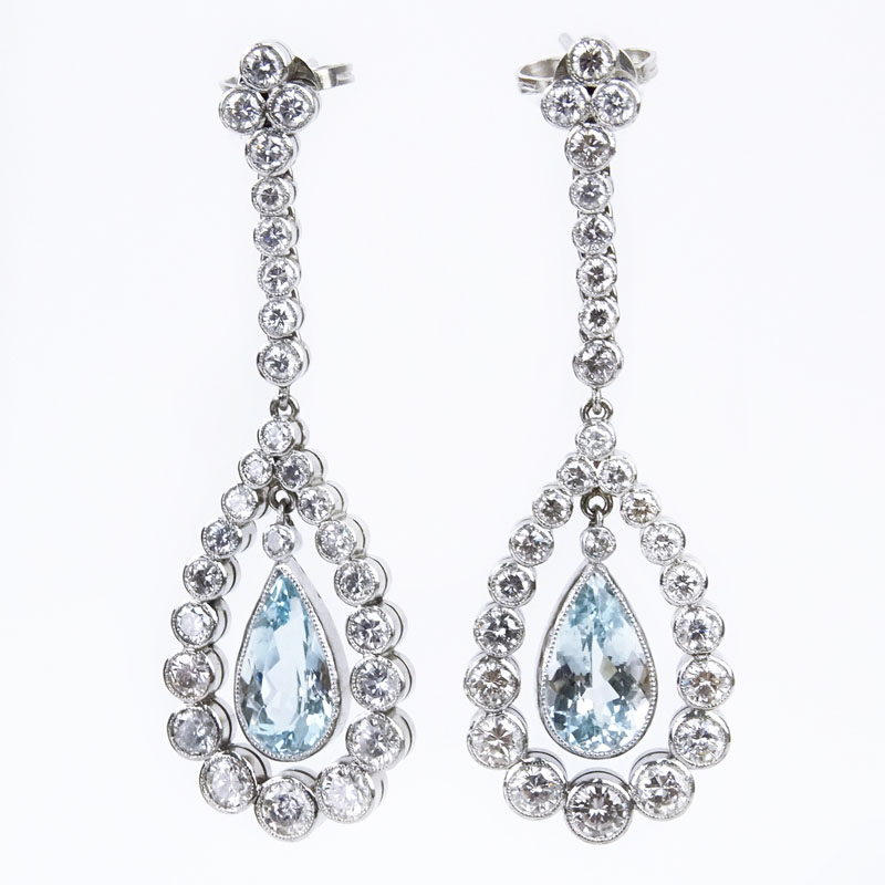  4.50 Carat Round Brilliant Cut Diamond, 6.0 Carat Pear Shape Aquamarine and Platinum Chandelier Earrings.