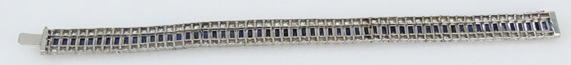  21.0 Carat Emerald Cut Sapphire, 6.50 carat Round Brilliant Cut Diamond and Platinum Bracelet. 