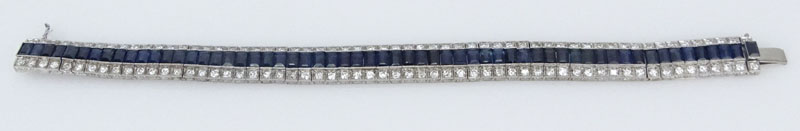  21.0 Carat Emerald Cut Sapphire, 6.50 carat Round Brilliant Cut Diamond and Platinum Bracelet. 