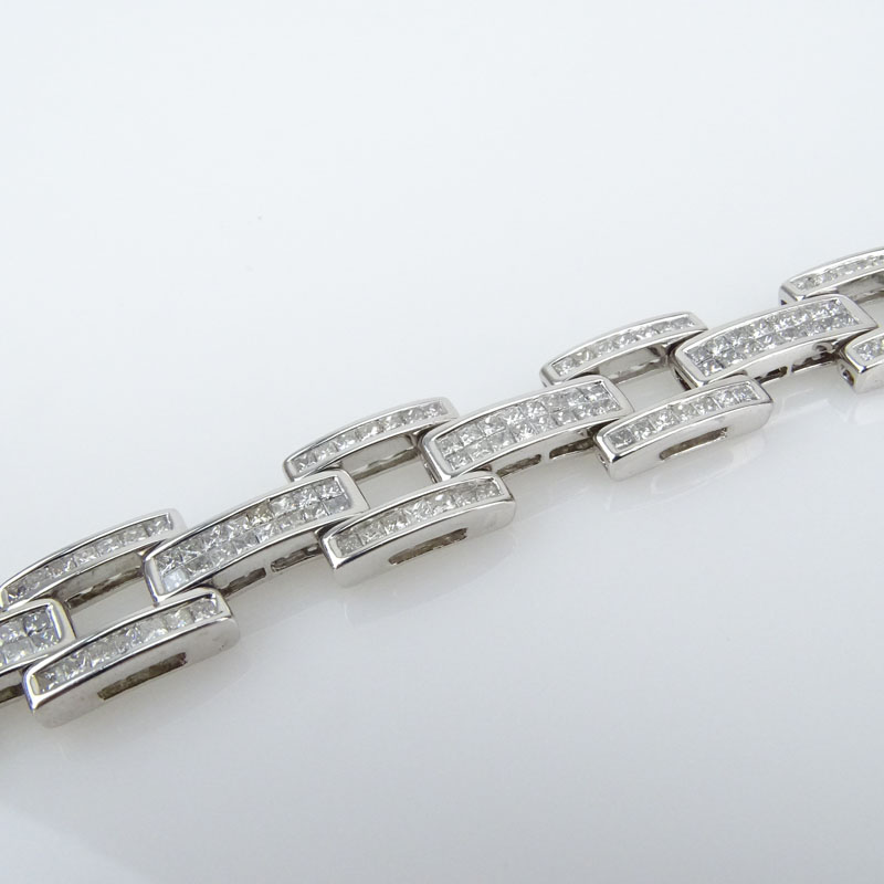 11.75 Carat Invisible Set Square Cut Diamond and 14 Karat White Gold Bracelet.