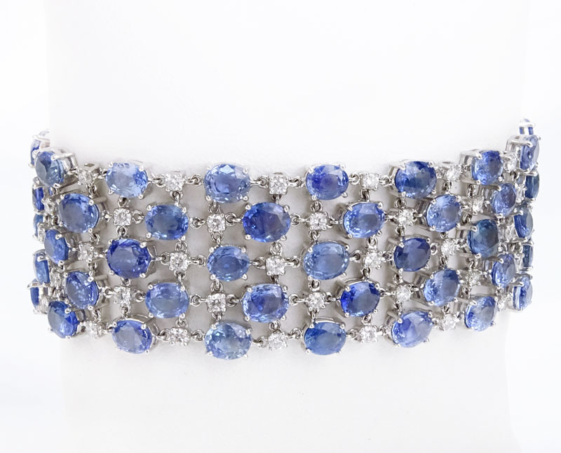 56.50 Carat Oval Cut Sapphire, 3.60 Carat Round Brilliant Cut Diamond and 18 Karat White Gold Bracelet. 