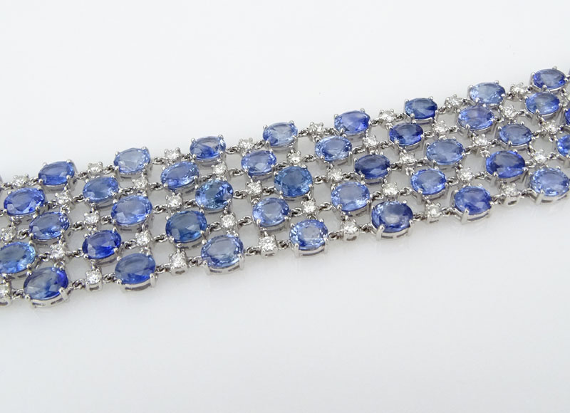 56.50 Carat Oval Cut Sapphire, 3.60 Carat Round Brilliant Cut Diamond and 18 Karat White Gold Bracelet. 