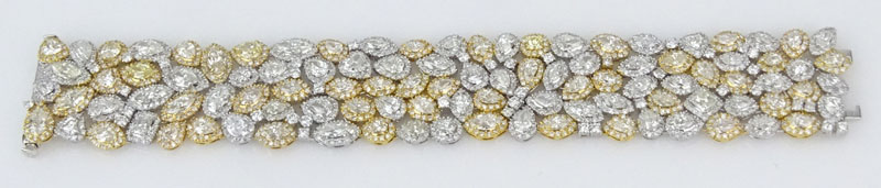 37.50 Carat Mixed Cut Colorless and Fancy Yellow Diamond and 18 Karat Yellow and White Gold Bracelet.