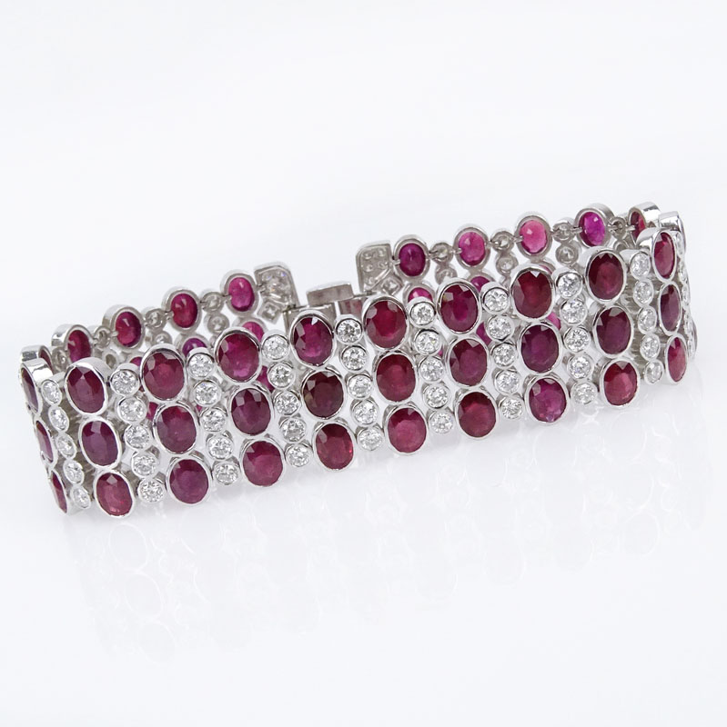  27.50 Carat Oval Cut Burma Ruby, 5.70 Carat Round Brilliant Cut Diamond and 18 Karat White Gold Bracelet. 