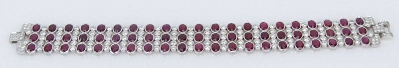  27.50 Carat Oval Cut Burma Ruby, 5.70 Carat Round Brilliant Cut Diamond and 18 Karat White Gold Bracelet. 