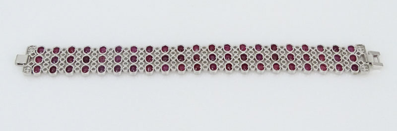  27.50 Carat Oval Cut Burma Ruby, 5.70 Carat Round Brilliant Cut Diamond and 18 Karat White Gold Bracelet. 