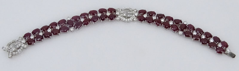 41.50 Carat Oval Cut Burma Ruby, 4.35 Carat Round Brilliant Cut Diamond and 18 Karat White Gold Bracelet. 