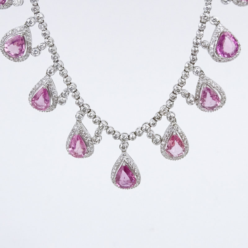  20.13 Carat Pear Shape Pink Sapphire, 13.05 Carat Round Brilliant Cut Diamond and 18 Karat White Gold Necklace.