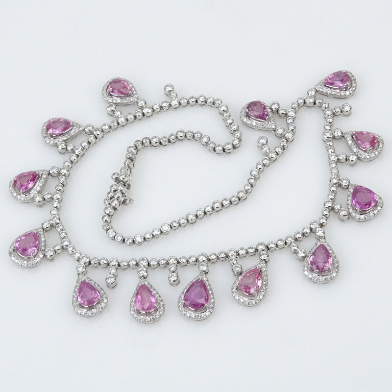  20.13 Carat Pear Shape Pink Sapphire, 13.05 Carat Round Brilliant Cut Diamond and 18 Karat White Gold Necklace.