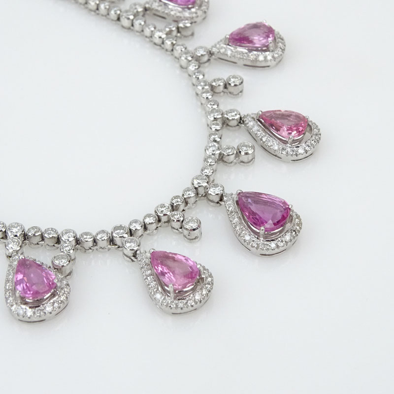  20.13 Carat Pear Shape Pink Sapphire, 13.05 Carat Round Brilliant Cut Diamond and 18 Karat White Gold Necklace.