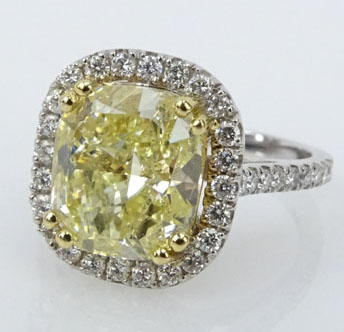 GIA Certified 4.01 Carat Cushion Cut Fancy Light Yellow Diamond and 18 Karat White Gold Engagement Ring