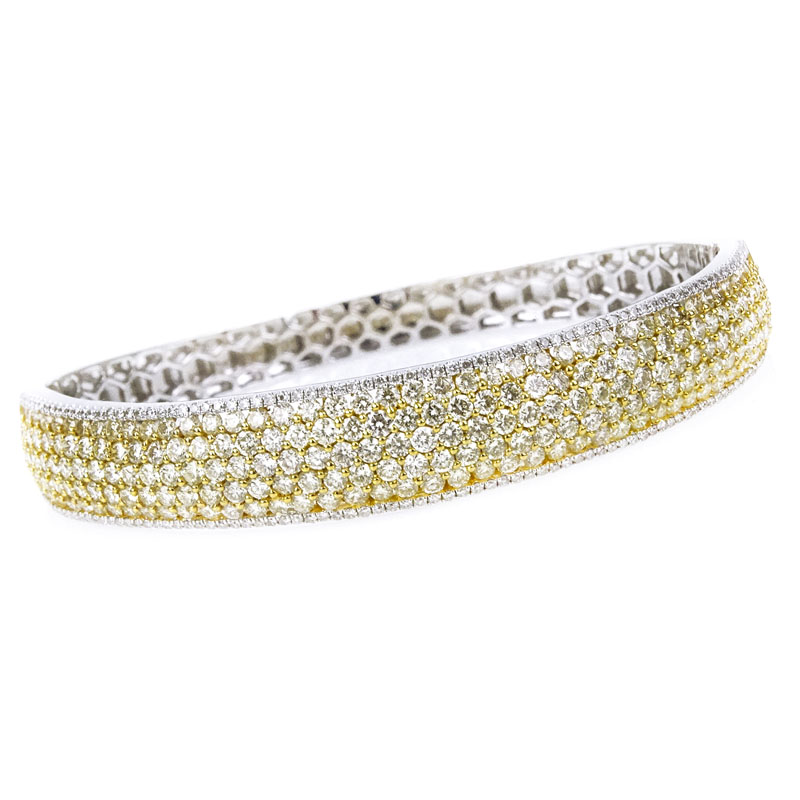 Mark Oliva signed Approx. 7.50 Karat Round Brilliant Cut Fancy Light Yellow and White Diamond and 18 Karat White Gold Bangle Bracelet.