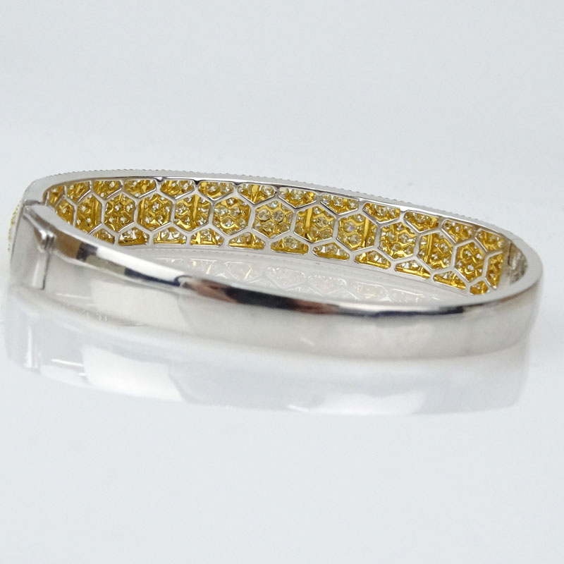 Mark Oliva signed Approx. 7.50 Karat Round Brilliant Cut Fancy Light Yellow and White Diamond and 18 Karat White Gold Bangle Bracelet.