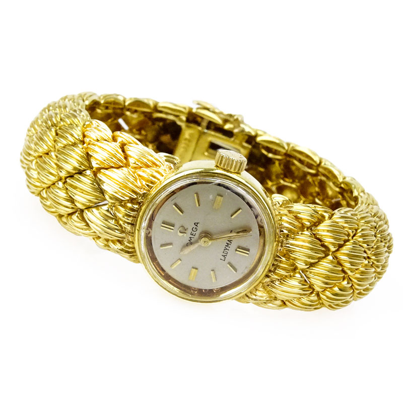 Vintage David Webb Heavy 18 Karat Yellow Gold Bracelet Watch with Omega Automatic Movement