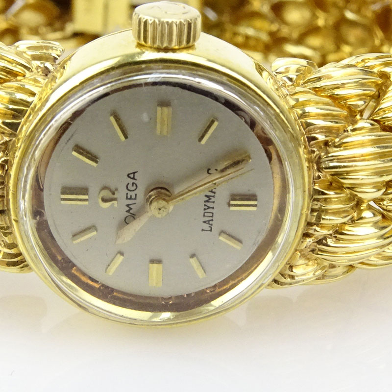 Vintage David Webb Heavy 18 Karat Yellow Gold Bracelet Watch with Omega Automatic Movement