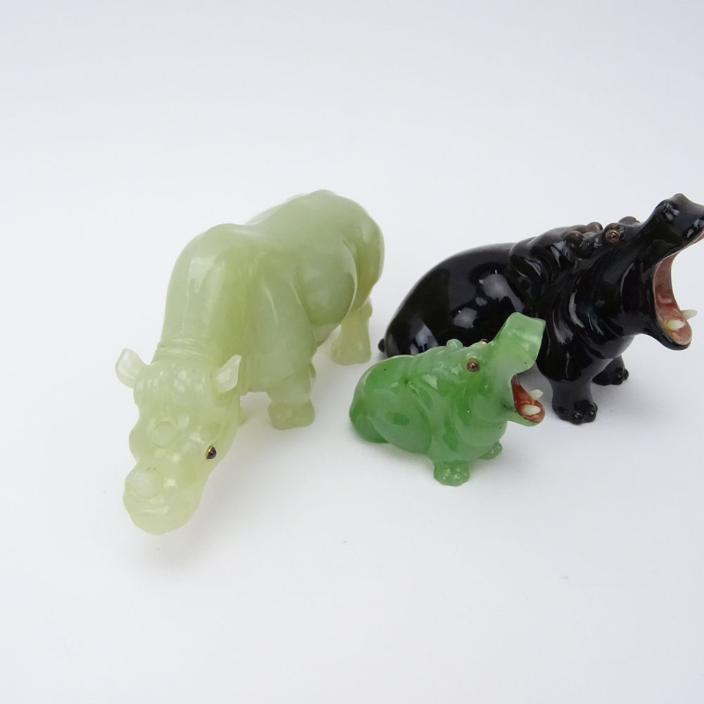 Collection of Three (3) 20th Century Russian Carved Stone Animal Figures Including a Carved Jade Rhino, a Carved Obsidian Hippo and a Miniature Carved Jade Hippo all in a fitted wood box signed Faberge