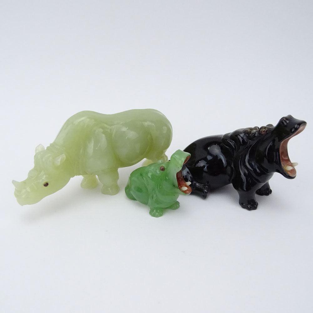 Collection of Three (3) 20th Century Russian Carved Stone Animal Figures Including a Carved Jade Rhino, a Carved Obsidian Hippo and a Miniature Carved Jade Hippo all in a fitted wood box signed Faberge