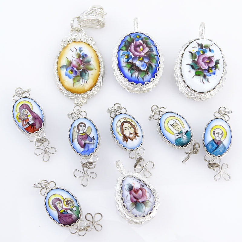 Collection of Ten (10) Russian Porcelain and White Metal Pendants