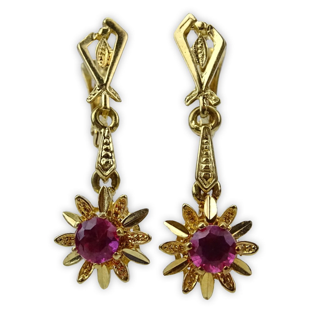 Pair of Vintage European 18 Karat Yellow Gold and Round Cut Ruby Earrings