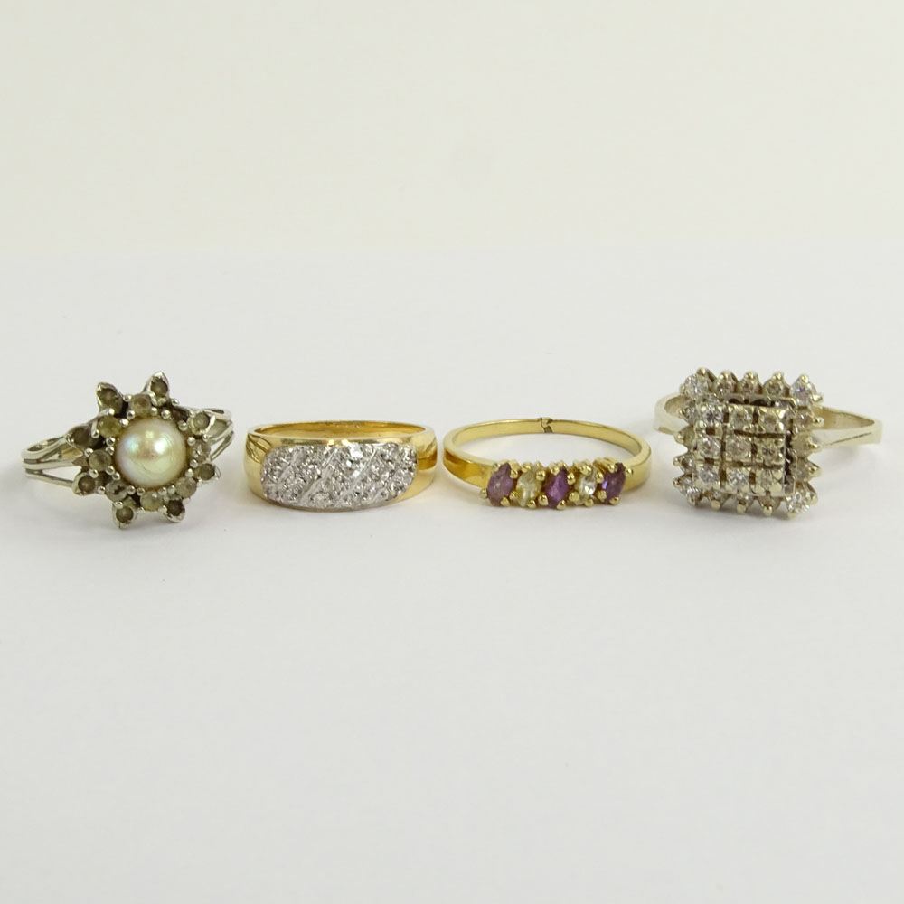 Collection of Four (4) Diamond and Gemstone Rings