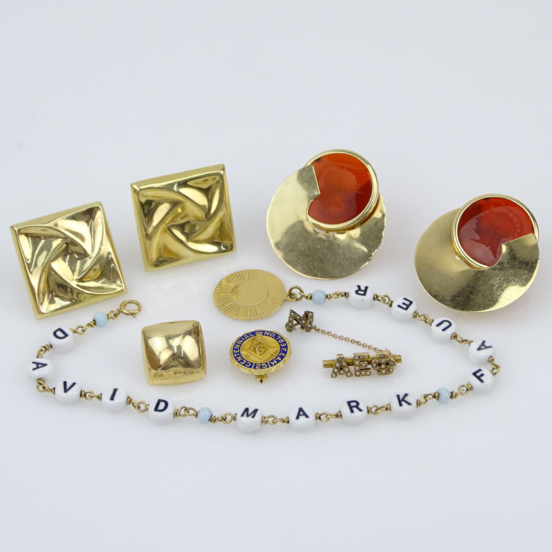 Vintage Eight (8) Piece 14 Karat Yellow Jewelry Lot Including a Pair of Earrings with Carved Carnelian, Pair of Square Earrings, One Button style Earring, A Sorority Pin, A Mason Pin with Enamel and a Mother's Bracelet with beads