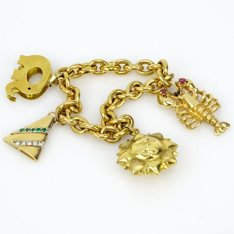 Vintage Italian 18 Karat Yellow Gold Charm Bracelet with One (1) 18 Karat Yellow Gold Charm (elephant) and Three (3) 14 Karat Yellow Gold Charms