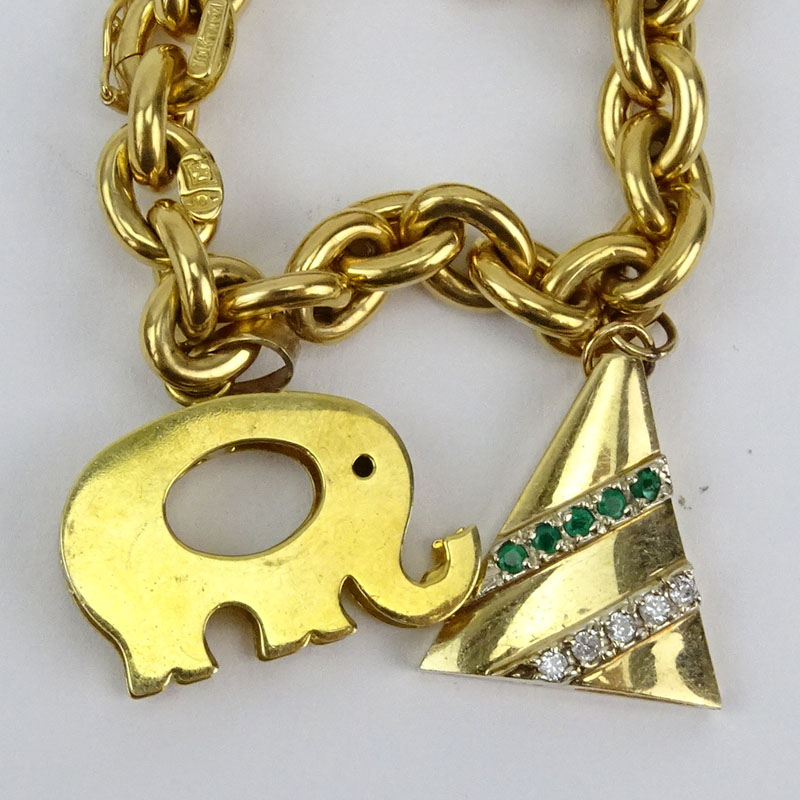 Vintage Italian 18 Karat Yellow Gold Charm Bracelet with One (1) 18 Karat Yellow Gold Charm (elephant) and Three (3) 14 Karat Yellow Gold Charms