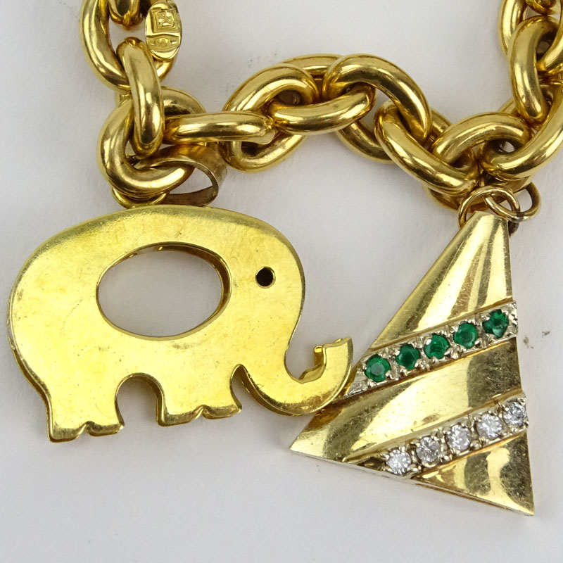 Vintage Italian 18 Karat Yellow Gold Charm Bracelet with One (1) 18 Karat Yellow Gold Charm (elephant) and Three (3) 14 Karat Yellow Gold Charms