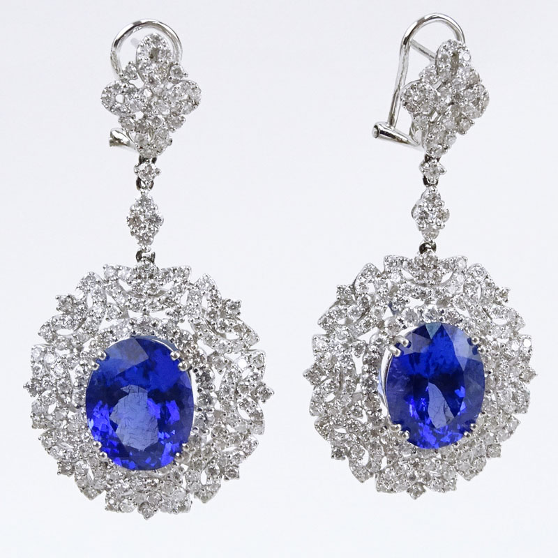 12.0 Carat Oval Cut Tanzanite, 6.0 Carat Round Brilliant Cut Diamond and 18 Karat White Gold Pendant Earrings. 