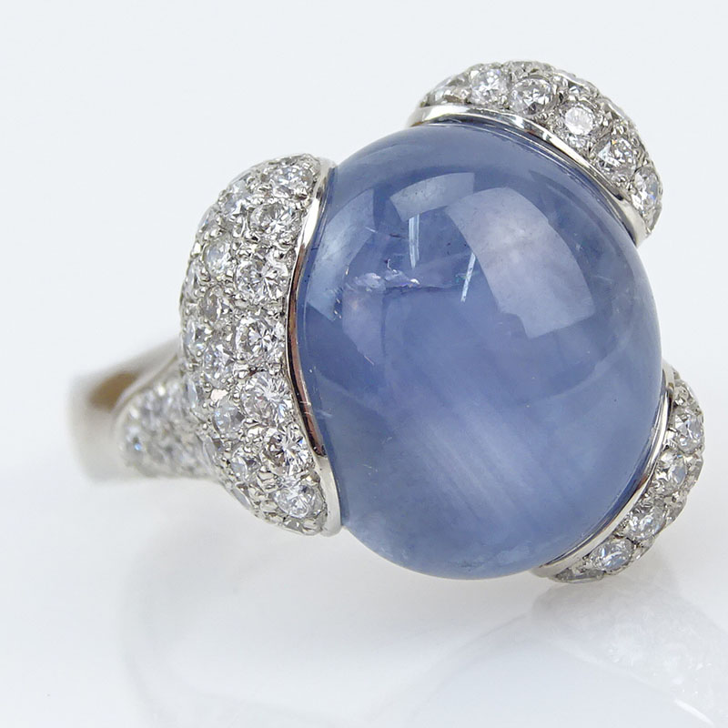  20.36 Carat Oval Cabochon Star Sapphire, 2.14 Carat Pave Set Round Cut Diamond and Platinum Ring. 