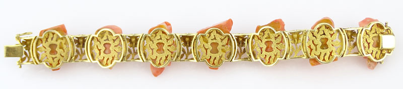 Vintage Carved Coral and 14 Karat Yellow Gold Bracelet Set with Seven Relief Carved Cameos