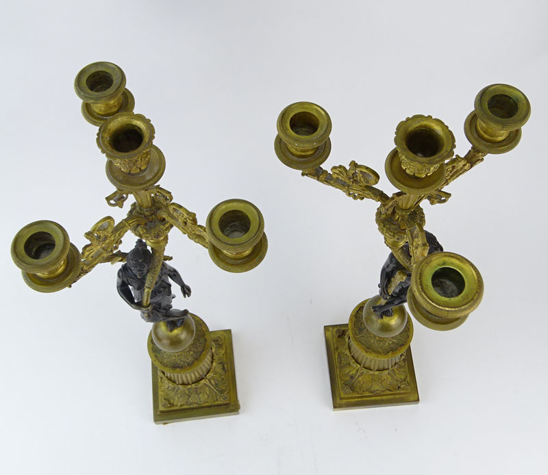 Pair of French 19th Century Charles X Patinated and Gilt Bronze Figural Four Light Candelabra