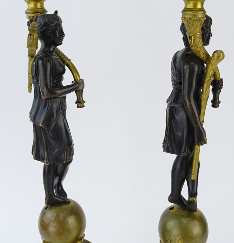 Pair of French 19th Century Charles X Patinated and Gilt Bronze Figural Four Light Candelabra