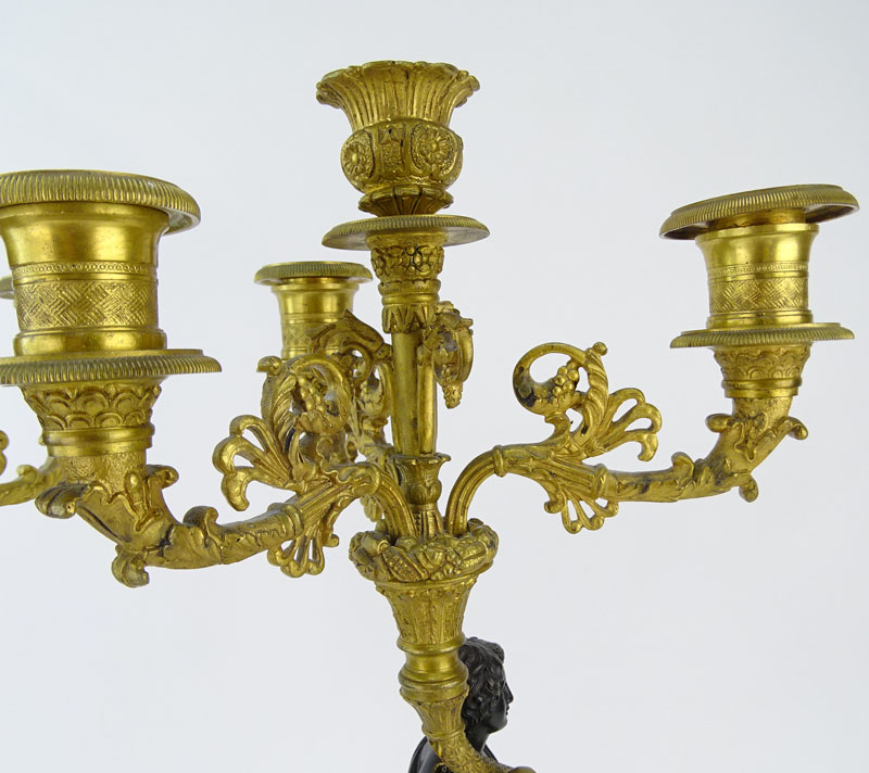 Pair of French 19th Century Charles X Patinated and Gilt Bronze Figural Four Light Candelabra