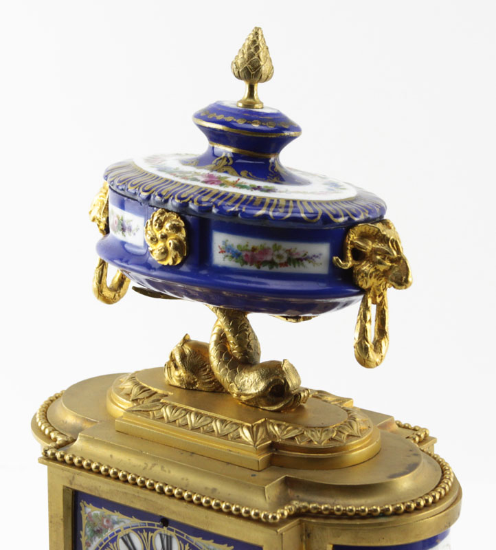 Antique French Louis XVI Style Clock Garniture Set with gilt bronze and blue porcelain Sevres style panels