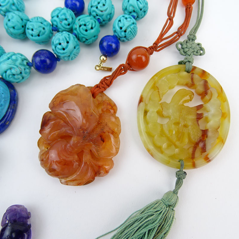 Grouping of Seven (7) Necklaces, Carvings, and Pendant