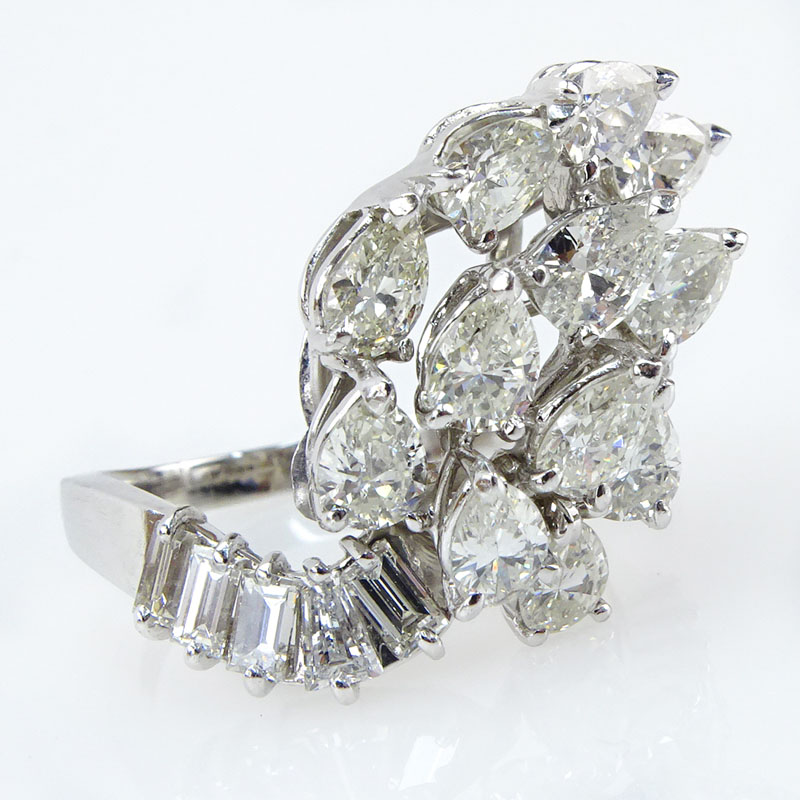 4.5 Carat Pear and Baguette Cut Diamond and 18 Karat White Gold Ring.