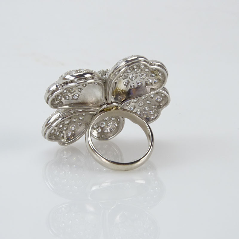 12.0 Carat Round Brilliant Cut Diamond and 18 Karat White Gold Flower Ring.