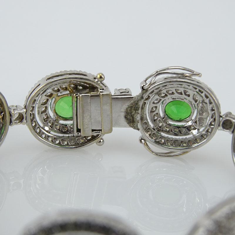 10.43 Carat Oval Cut Tsavorite Garnet, 6.55 Karat Round Brilliant Cut Diamond and 18 Karat White Gold Bracelet. 