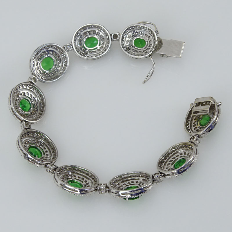 10.43 Carat Oval Cut Tsavorite Garnet, 6.55 Karat Round Brilliant Cut Diamond and 18 Karat White Gold Bracelet. 