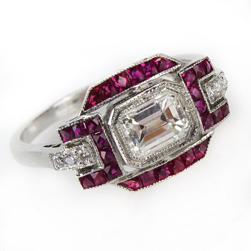 .73 Carat TW Diamond, 1.13 Carat Ruby and Platinum Ring Set in the Center with an Approx. .69 Carat Emerald Cut Diamond.