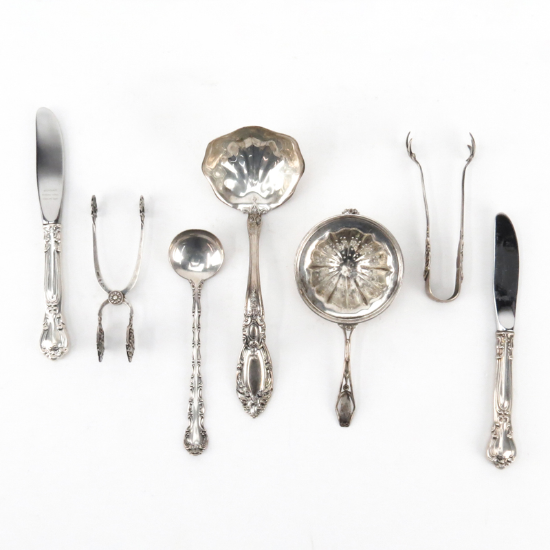 Collection of Seven (7) Sterling Silver Utensils Including: A Towle King Richard Pattern Sauce Ladle; A Gorham Stasbourg Pattern Sauce Spoon; A Gorham Old Medici Pattern Sugar Tongs; a Norway Hestenes Sugar Tongs and Two (2) Silver Handle Butter Knives